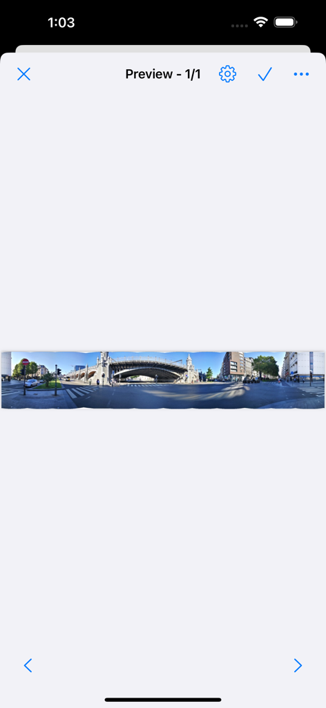 A wide panoramic image of a city street displayed in the Bimostitch app preview screen
