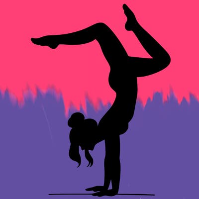 a woman doing a handstand