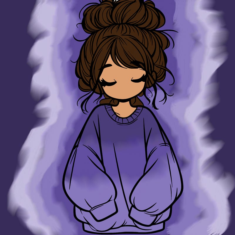 girl with baggy sweatshirt and messy bun