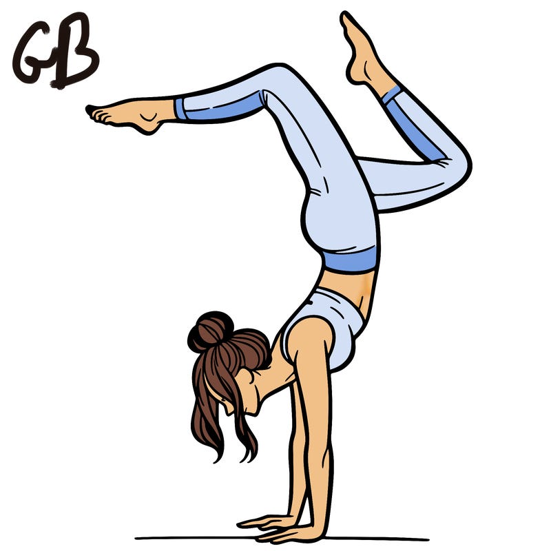 a woman doing a handstand