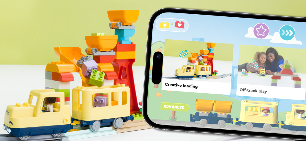 LEGO® DUPLO® Trains - LEGO DUPLO Trains app interface next to physical DUPLO train bricks