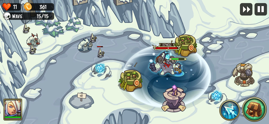 Empire Warriors Tower Defense gameplay on a snowy map with heroes and towers