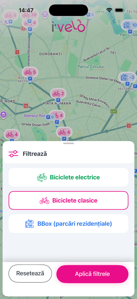 Die i'velo App-Oberfläche zeigt eine Karte von Fahrradstationen und ein Filtermenü für Elektro- und klassische Fahrräder