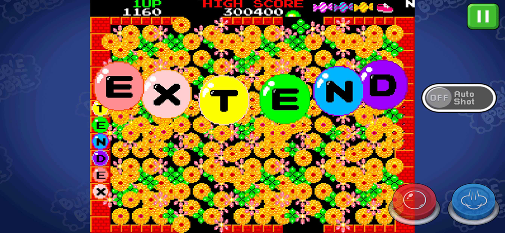 BUBBLE BOBBLE classic mobile gameplay screen showing colorful alphabet bubbles spelling the word EXTEND