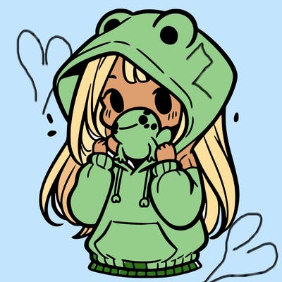 a girl holding a froggy hoodie