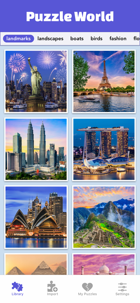 Galería de puzles de monumentos en la aplicación Puzzle World que presenta lugares famosos del mundo como la Torre Eiffel y la Estatua de la Libertad