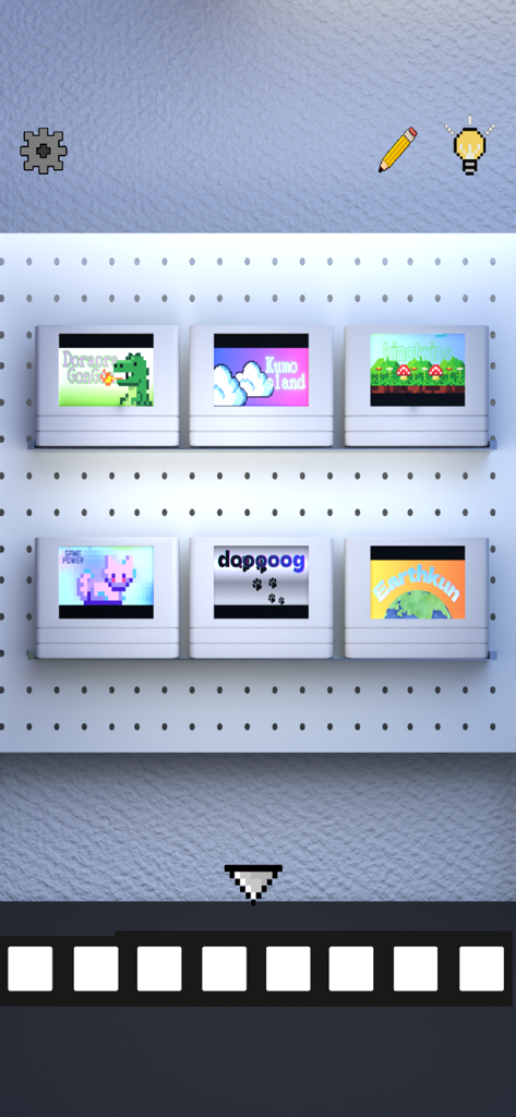 脱出ゲーム  ゲーム配信者の家から出たい - Una colección de cartuchos de videojuegos retro en un tablero perforado dentro de una sala de escape de casa de streamer.