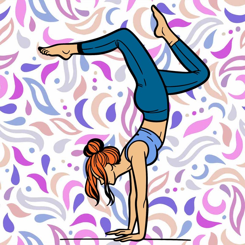 a woman doing a handstand