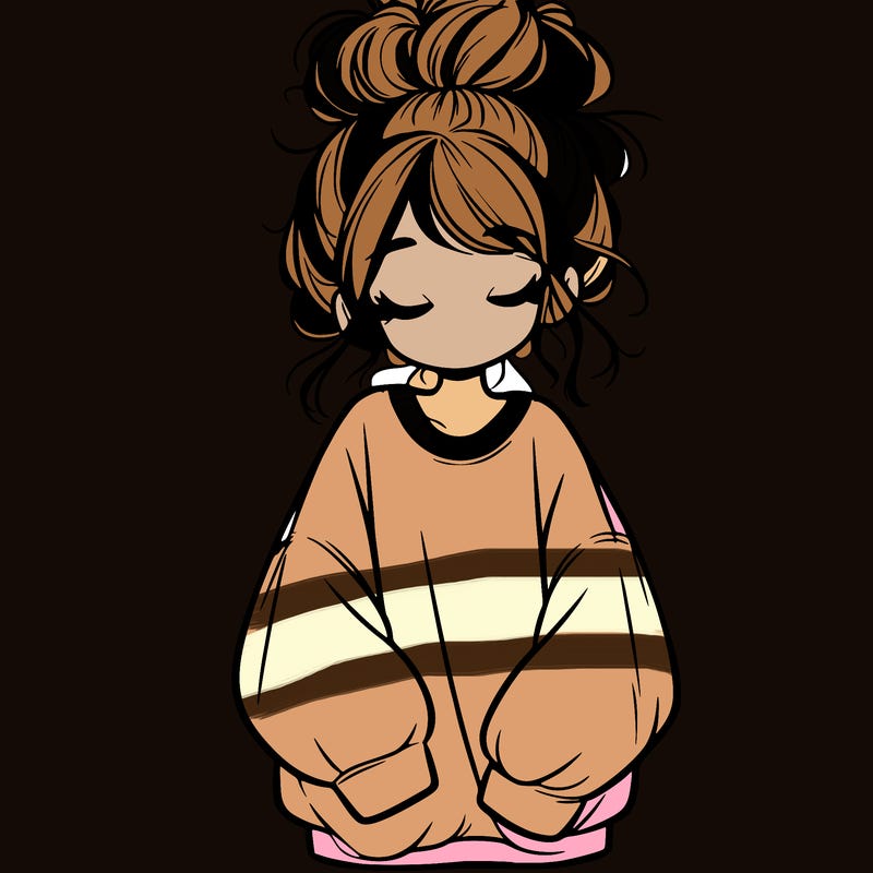 girl with baggy sweatshirt and messy bun