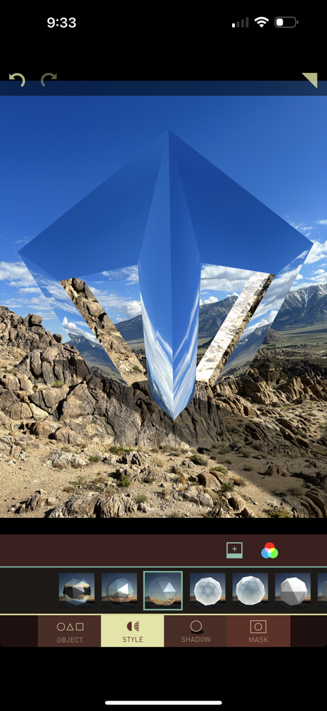 Matter - 3D Effects - A 3D reflective geometric object being edited over a mountain landscape in the Matter app