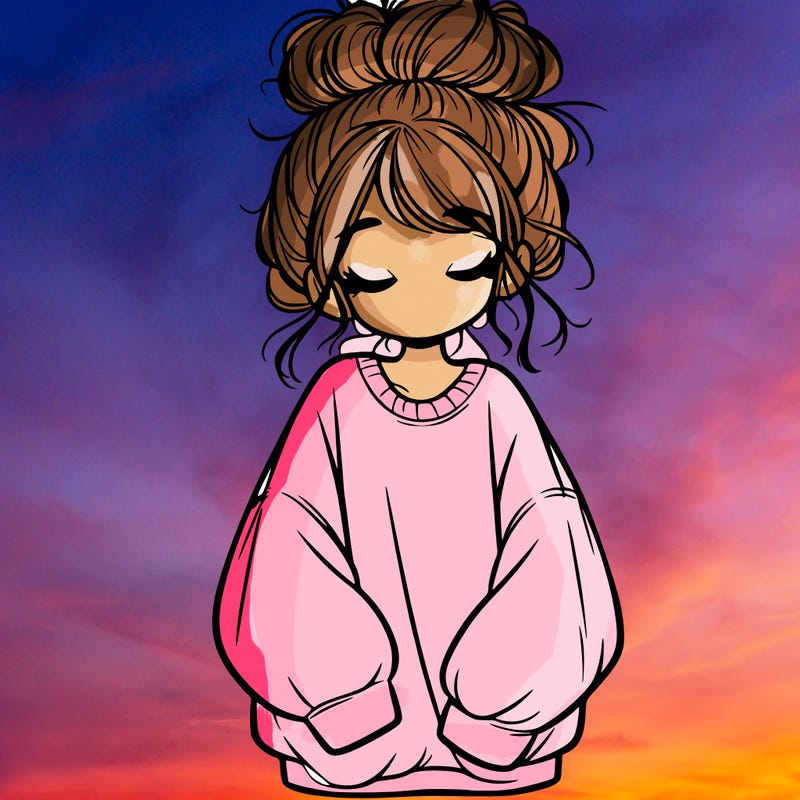 girl with baggy sweatshirt and messy bun