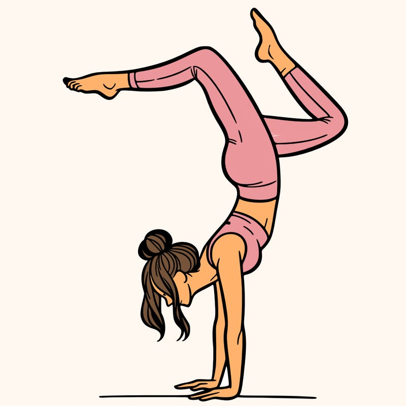 a woman doing a handstand