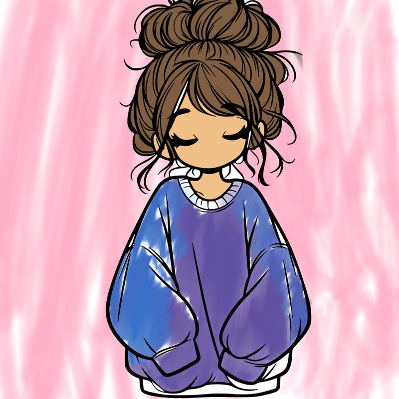 girl with baggy sweatshirt and messy bun