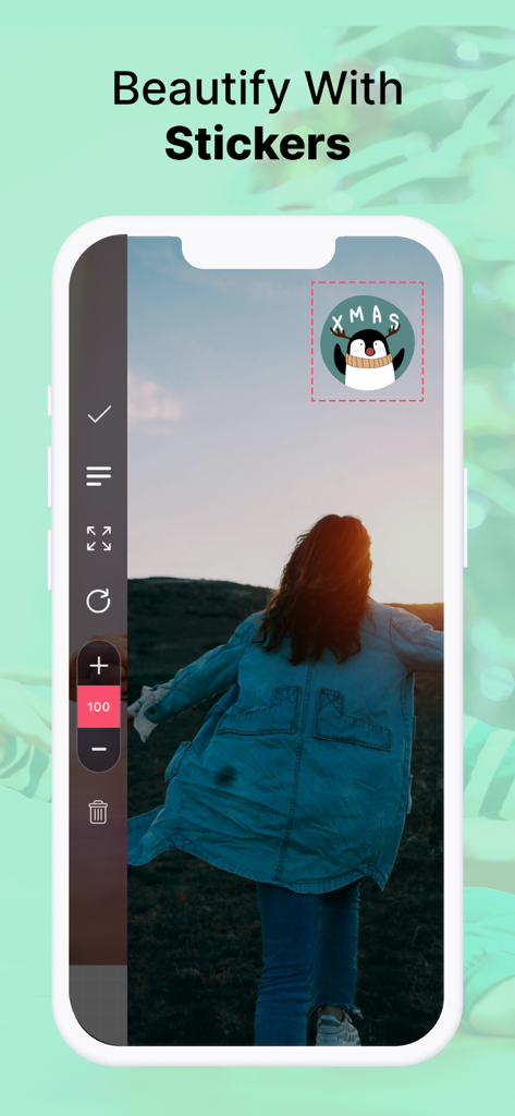 eZy Watermark Videos Pro - Interfaz de la aplicación móvil mostrando una pegatina de pingüino navideño añadida a un video