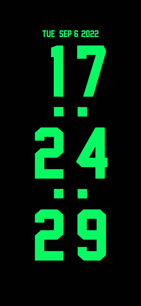 Desk Clock - Analog Clock Face - Un reloj digital vertical a pantalla completa con números verdes grandes y fecha sobre un fondo negro