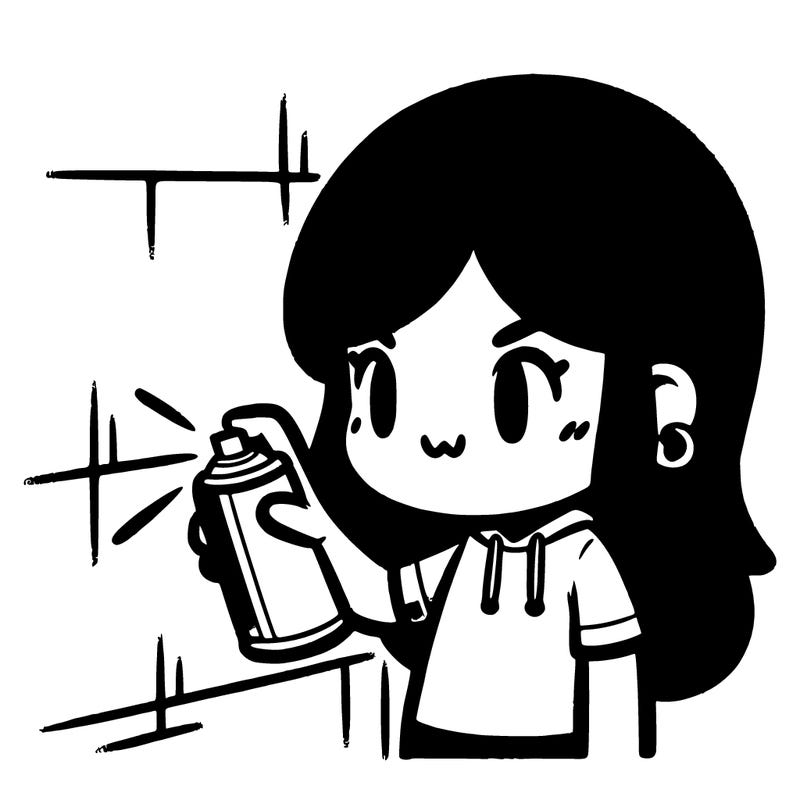 girl spray painting a wall