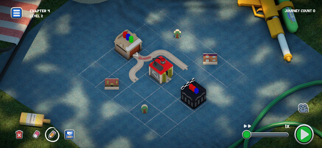 Teeny Tiny Trains - Gioco di strategia rompicapo in Teeny Tiny Trains con binari in legno e miniature di edifici su una coperta da picnic