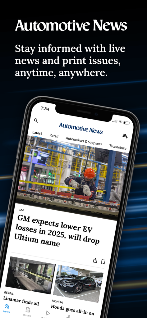 Automotive News - Smartphone screen showing the Automotive News app with industry headlines about GM electric vehicles