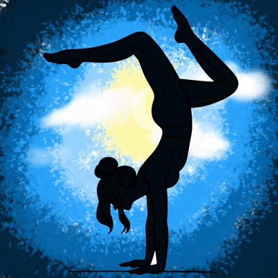 a woman doing a handstand