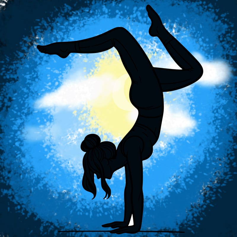 a woman doing a handstand