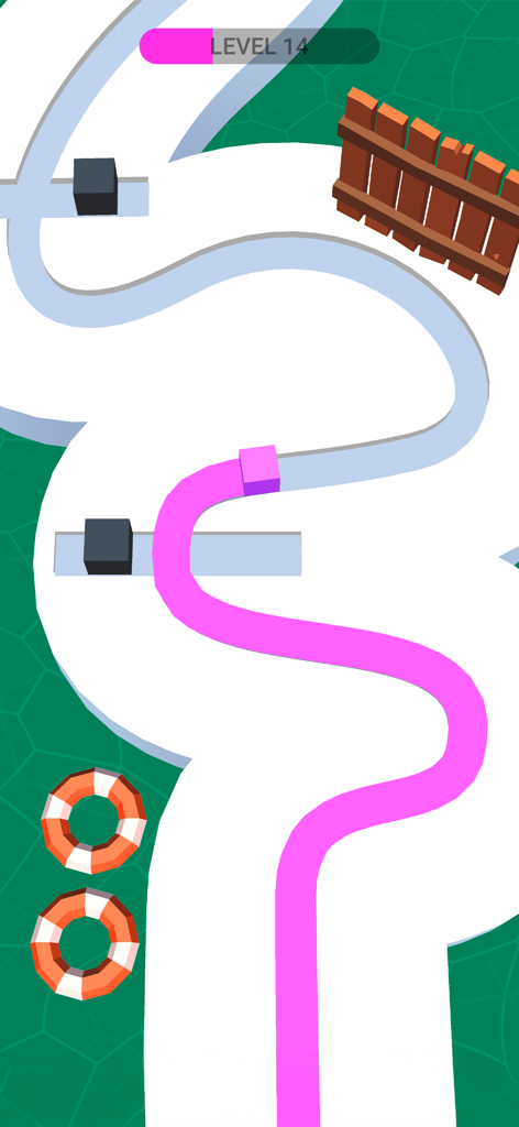 Line Color 3D - Line Color 3Dで、ピンクのキューブが曲がりくねった道をトレースするようにペイントしている様子。