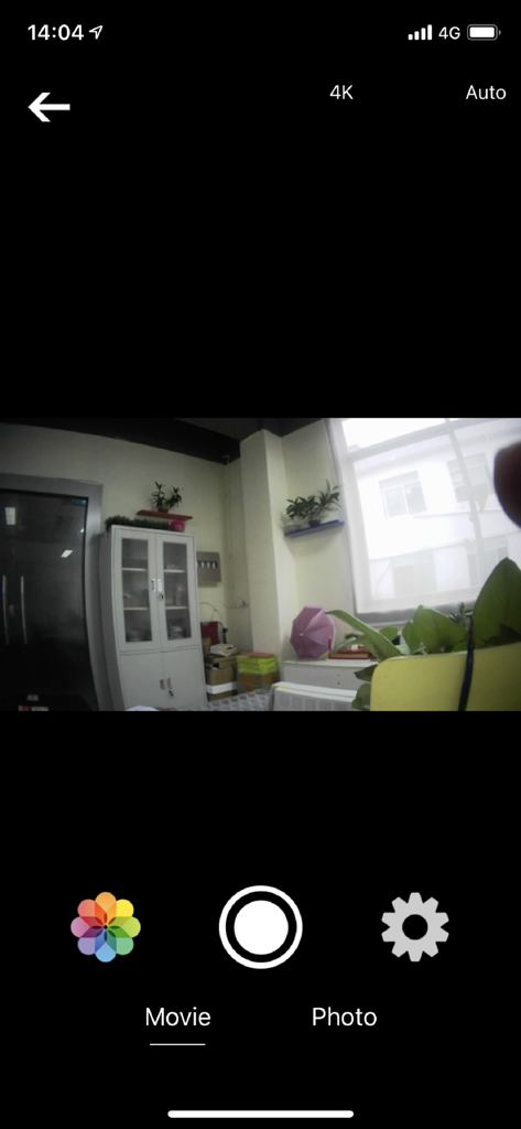 Live DV - Live DV app interface showing a real-time camera preview with movie and photo controls