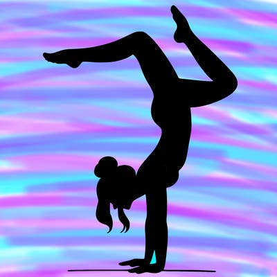 a woman doing a handstand