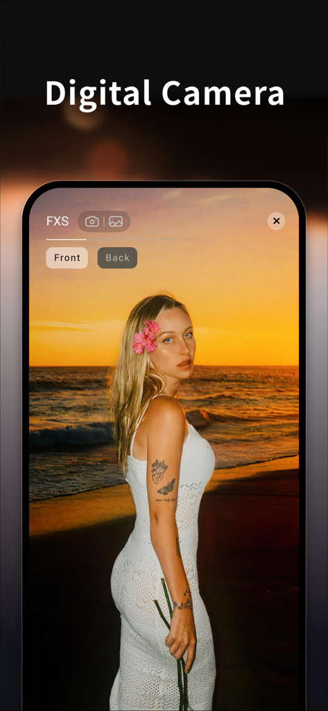 A woman in a white dress on a beach at sunset with a vintage digital camera filter effect