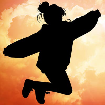 realistic girl jumping with a bun and oversized sweatshirt