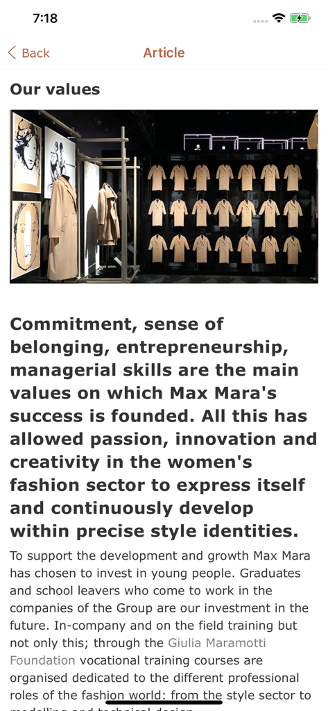 MMFG People - Screen from the MMFG People app showing an article about company values with a display of Max Mara coats