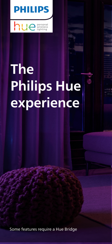 Philips Hue - 아늑한 방 안의 보라색 앰비언트 조명이 있는 Philips Hue 앱 인트로 화면