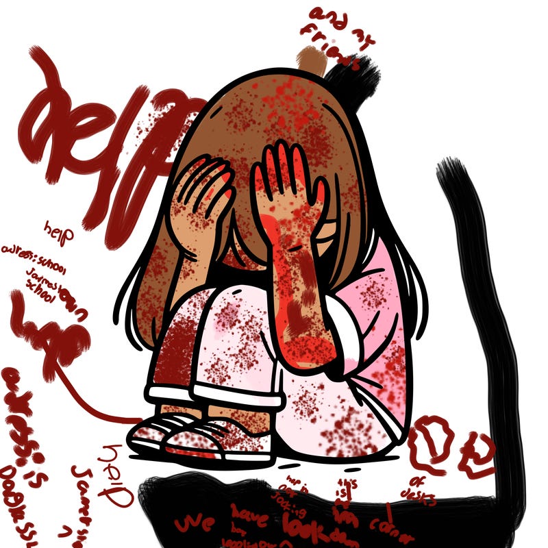 girl sitting down covering her head