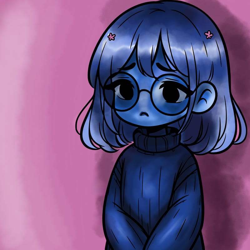 sad girl with glasses in a sweater