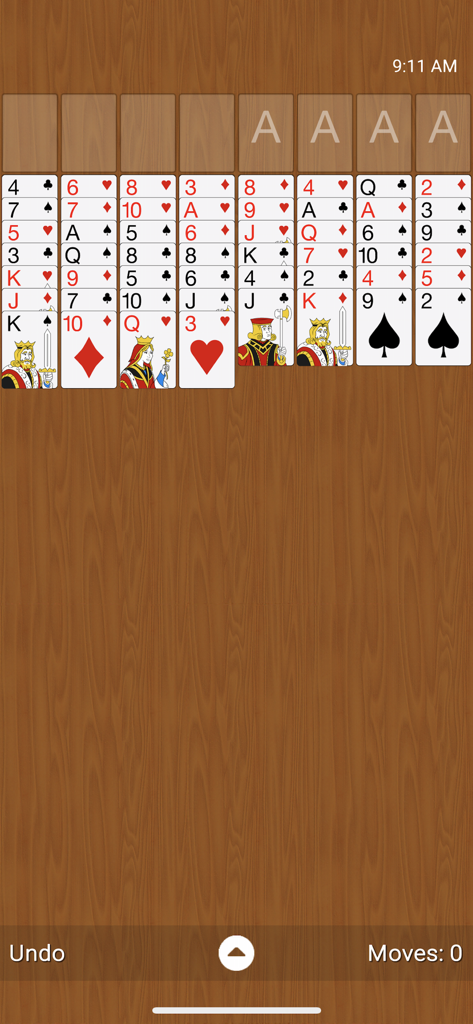 Free Cell Classic - Gameplay of Free Cell Classic solitaire card game on a wooden background