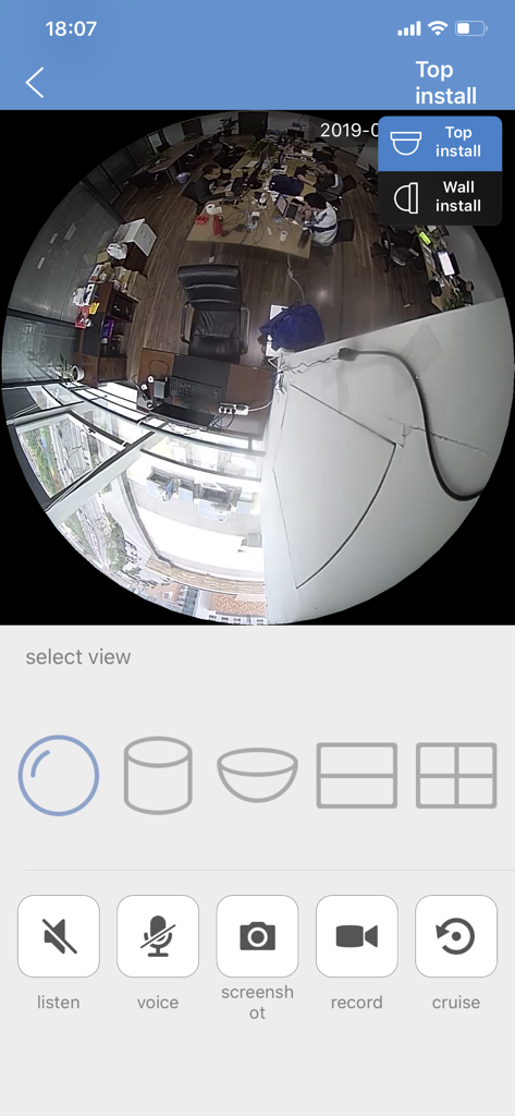 CamHi - CamHi app interface displaying a 360 degree fisheye camera view of an office with monitoring controls like listen voice and record