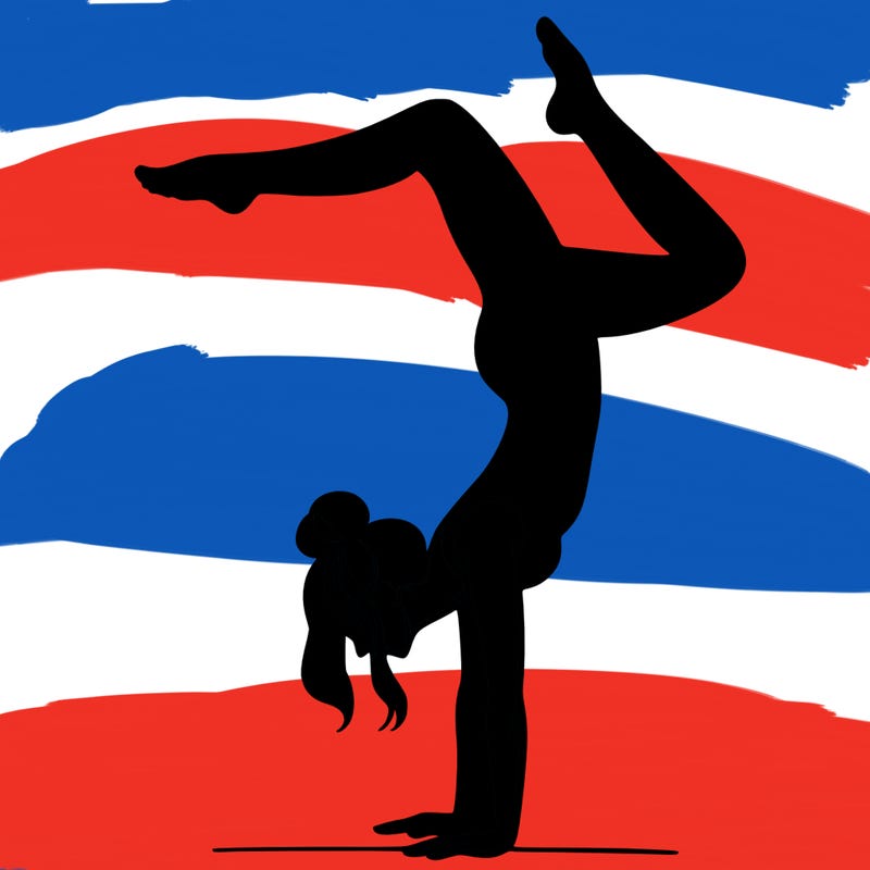 a woman doing a handstand