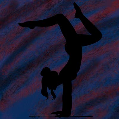 a woman doing a handstand