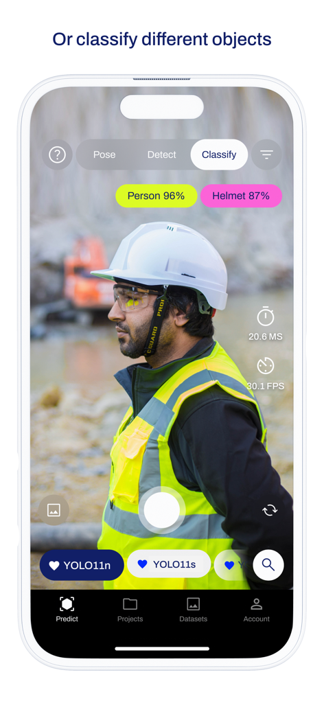 Ultralytics HUB - Ultralytics HUB app interface showing real-time object classification of a construction worker and helmet using YOLO11