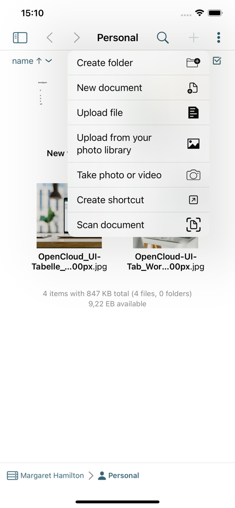 Interface de l'application OpenCloud montrant un menu déroulant avec des options pour créer des dossiers, télécharger des documents et scanner des fichiers.