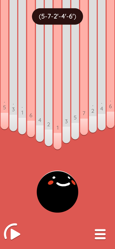 Digital kalimba instrument with seventeen numbered keys and a cute smiling face on a red background