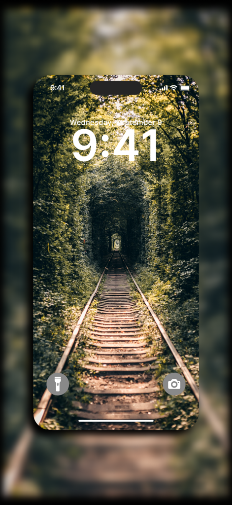 Live Wallpaper 4K - HD Theme - iPhone lock screen featuring a 4K wallpaper of a railway track through a green tree tunnel