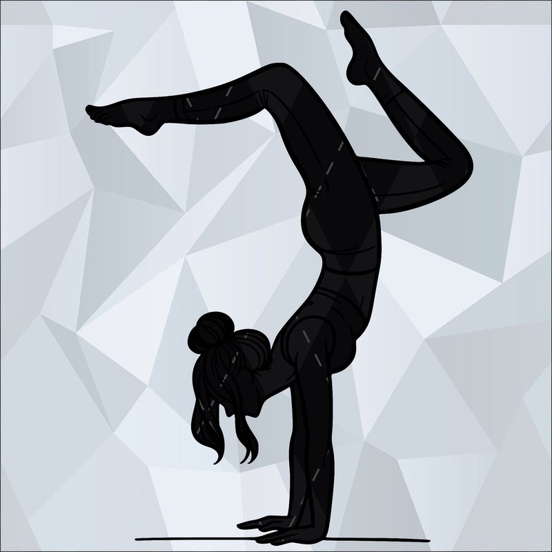 a woman doing a handstand