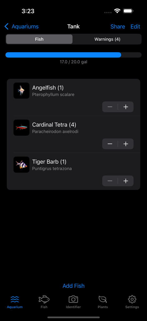 Aquarium Guide Fish Identifier - Mobile app interface showing a list of fish and tank capacity tracker for an aquarium