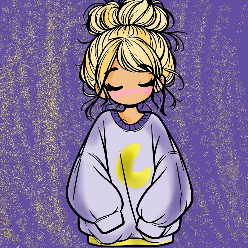 girl with baggy sweatshirt and messy bun