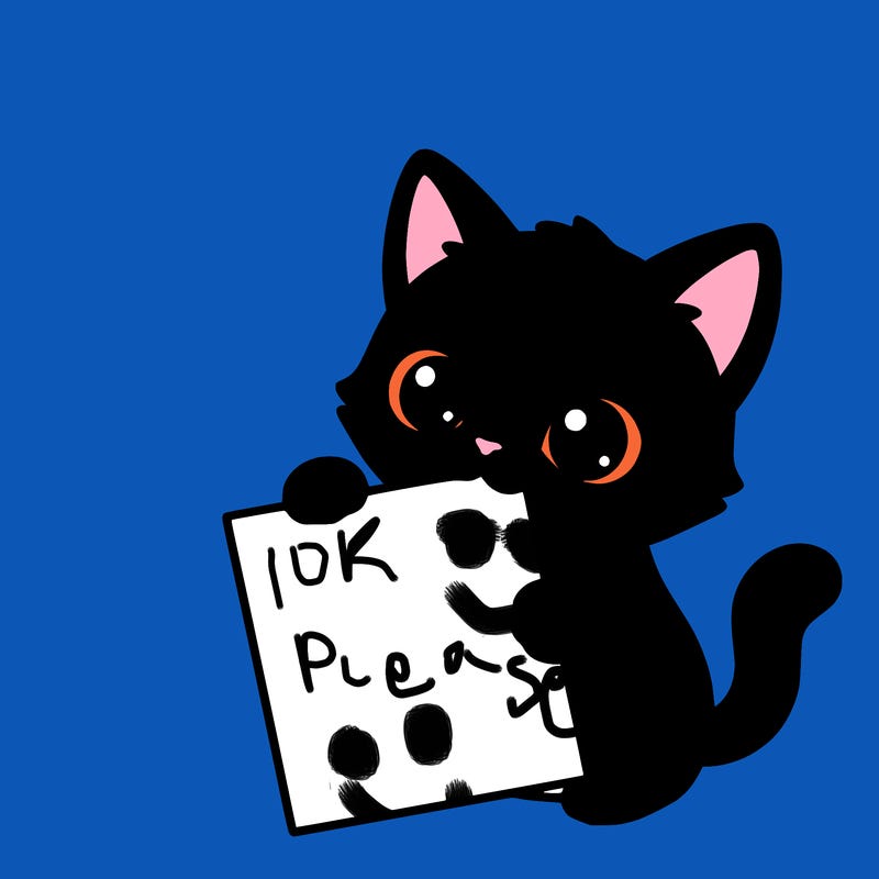 a small cat with a blank sheet of paper in its hand. the cat is sooooooo cute!