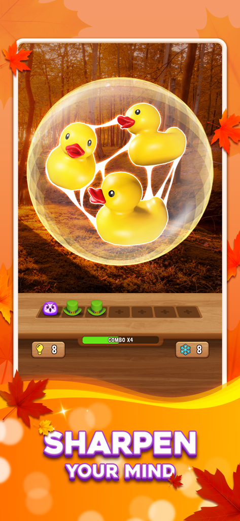 Una pantalla de juego de puzzles de emparejamiento 3D con patos de goma dentro de una burbuja con hojas de otoño y el texto 'agudiza tu mente'.