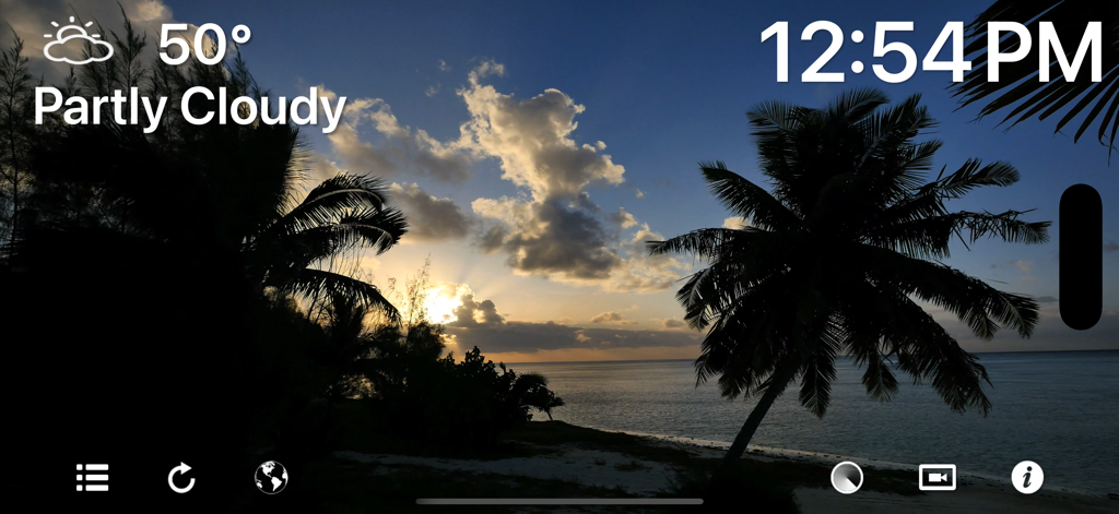 Motion Weather 4K - Ultra HD - Motion Weather 4K app displaying a tropical beach sunset with current temperature and time