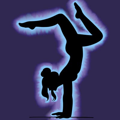 a woman doing a handstand