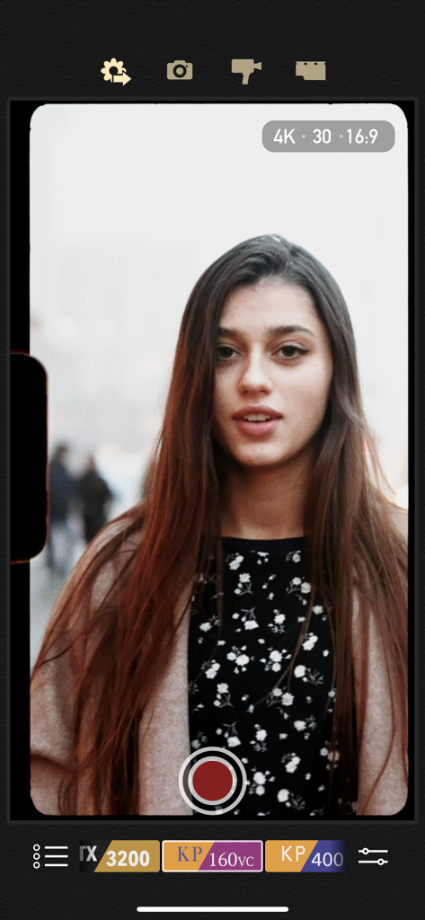 8mm Vintage Camera - 8mm Vintage Camera app interface featuring a live recording of a woman with retro film filters and 4k settings