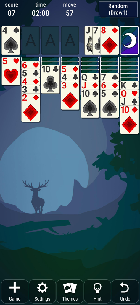 Gameplay of Classic Solitaire Patience with a nature themed background featuring a deer silhouette and moon.